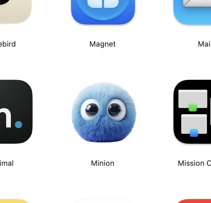 Minion, a soft blue spherical character on a light grid.